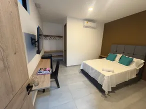 204 -Hotel suite with air conditioning, living room, dining room and kitchen - Image 5