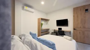 204 -Hotel suite with air conditioning, living room, dining room and kitchen - Image 3