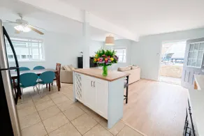 Bright Beach Retreat Patio - Image 4