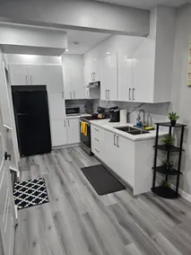 Modern 2BR suite in a quite, private neighborhood. - Image 2