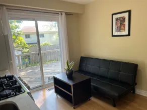 Cozy Private Main Floor Suite w/ Deck & Backyard - Image 2