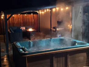 Modern Comfort with Hot Tub • Sleeps 12 • Patio - Image 3