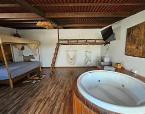 rustic cabin on roof garden with jacuzzi inside - Image 4