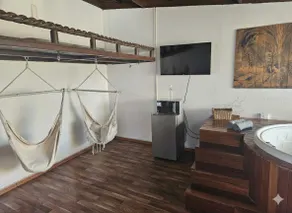 rustic cabin on roof garden with jacuzzi inside - Image 2
