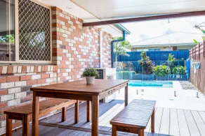 Theme Park Retreat - Sunlit Stillness by the Pool - Image 3