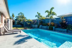Theme Park Retreat - Sunlit Stillness by the Pool - Image 2