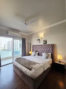 5 Pool-Facing 2BHK | Balcony & Pool Views - Image 4