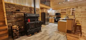 Remote OffGrid Kumbrabow Forest Cabin Fireplace - Image 3