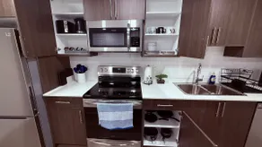 New & Modern Cozy Suite with Full Kitchen - Image 3