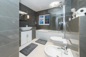 Spacious 4BR House with Parking for Work & Family - Image 5