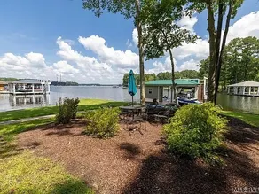 Serene lake front, DEEP water, boat lift, fire pit - Image 5