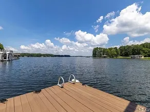 Serene lake front, DEEP water, boat lift, fire pit - Image 3
