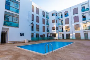 Luxury 2BR in Agadir Bay • Pool, Balcony & Beach - Image 3