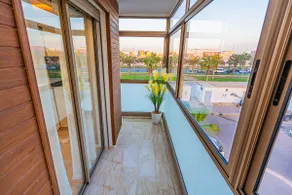 Luxury 2BR in Agadir Bay • Pool, Balcony & Beach - Image 4
