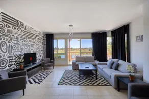 3BR Black&White ModernChalet | Rooftop Lagoon View - Image 2