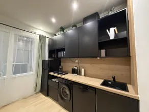 Charming 2-room apartment in the city center - Image 4