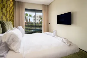Modern 2BR Duplex in Bouskoura | Pool Access | Parking - Image 4