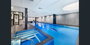 Resort-Style 2BR Escape Pool, Gym, Sauna, Parking - Image 5