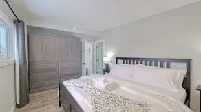 Modern 3BR Suite Steps to C-Train Near Zoo & DT - Image 5