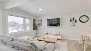 Modern 3BR Suite Steps to C-Train Near Zoo & DT - Image 4