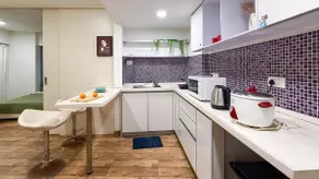Luxe 2-BHK Near Airport | A/C – Quiet – Kitchen – Smart TV – Wi-Fi - Image 3