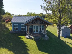 Peaceful getaway awaits this home on Lake Ontario - Image 2