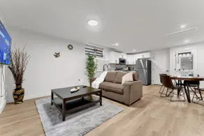 2-bedroom suite close to Amenities and Airport with on pad parking - Image 2