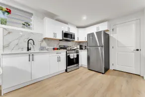 2-bedroom suite close to Amenities and Airport with on pad parking - Image 4