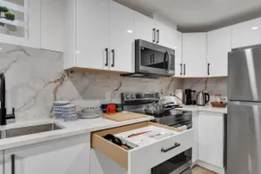 2-bedroom suite close to Amenities and Airport with on pad parking - Image 5