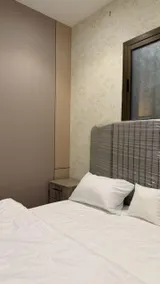 A room and a hall with a beautiful design and a car entrance - Image 5