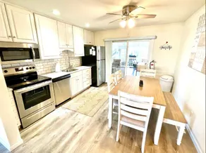 Steps to Beautiful Brigantine Beach. \n1st. Floor Unit with Private Porch. - Image 2