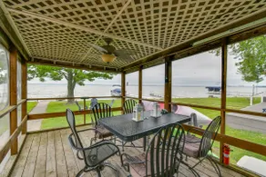 Porch + Views: Waterfront Home on Houghton Lake! - Image 2