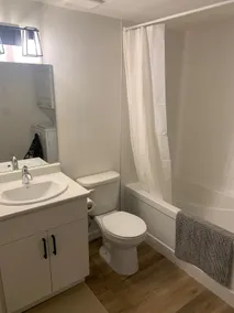 Basement Suite| 1BR | Sleeps 3 | Twin & Queen Beds - Image 4