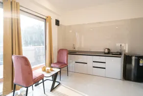 Premium Super Deluxe Room with Kitchen & Balcony - Image 4
