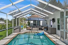 PalmHaus | Heated Pool•Outdoor TV•Coastal Retreat - Image 2