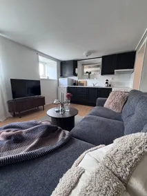 Conveniently located and cozy apartment with alcove bedrooms. - Image 2