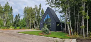 Modern Forest Retreat with Sauna and Hot Tub - Image 2