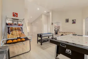 Modern 4BR Retreat with Game Room, Backyard & BBQ - Image 2