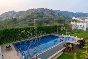 ELIVAAS Signature Prassanam Vatika 2-BHK Hillside Villa with Private Pool & Expansive 1-Acre Garden - Image 4