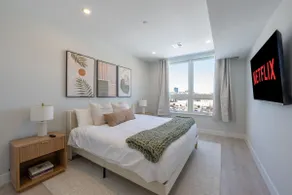 Luxe 2BR Retreat 5Min PATH to NYC Rooftop and Gym - Image 5