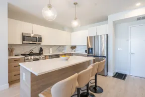 Luxe 2BR Retreat 5Min PATH to NYC Rooftop and Gym - Image 2