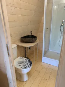 A small, comfortable cabin in a village. - Image 4