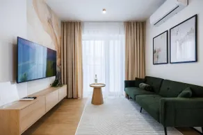 M1 Aura Apartments With AC, Free Parking by StayNest - Image 2