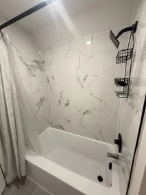 Newly Renovated 3BR/2BA with Private Attic Suite - Image 3