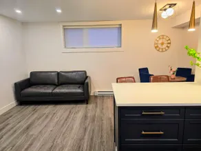 Modern Legal Suite | 5 Min to LRT | Homey Retreat - Image 3