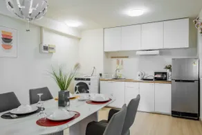 Nordic Minimal 3BR with Tub Near Impact Arena DMK Airport - Image 3