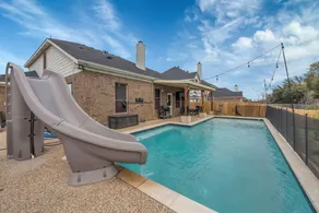 Spacious 4BR Retreat w/ Pool Slide & Fenced Yard - Image 2