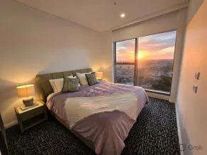 Sky-High City Views | Pools, Gym, Spa & King Bed - Image 2