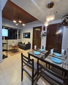 2BR Condotel in Ridgewood near NAIA Terminal 3, BGC and Venice with Pool, WIFI and Netflix - Image 4