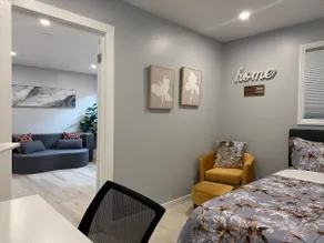 Stylish 1BR Suite w Living Room Fridge Microwave - Image 4